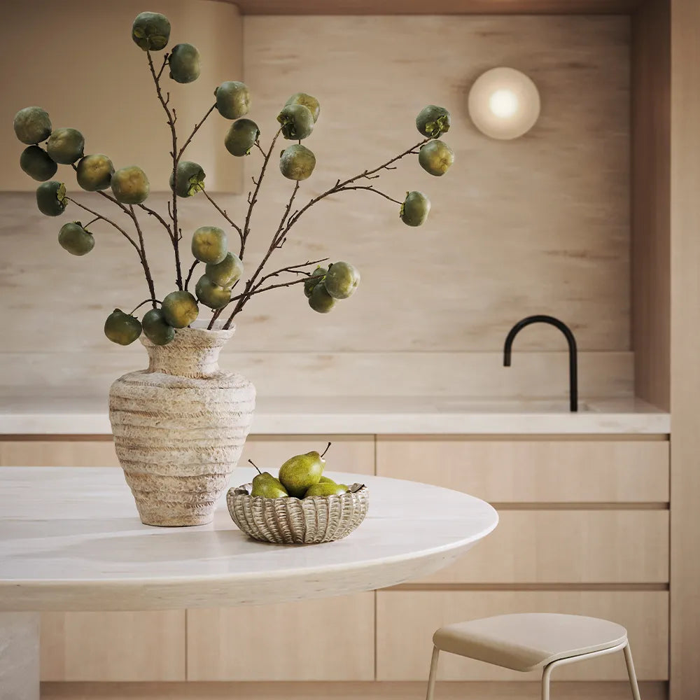 vases on white side table
