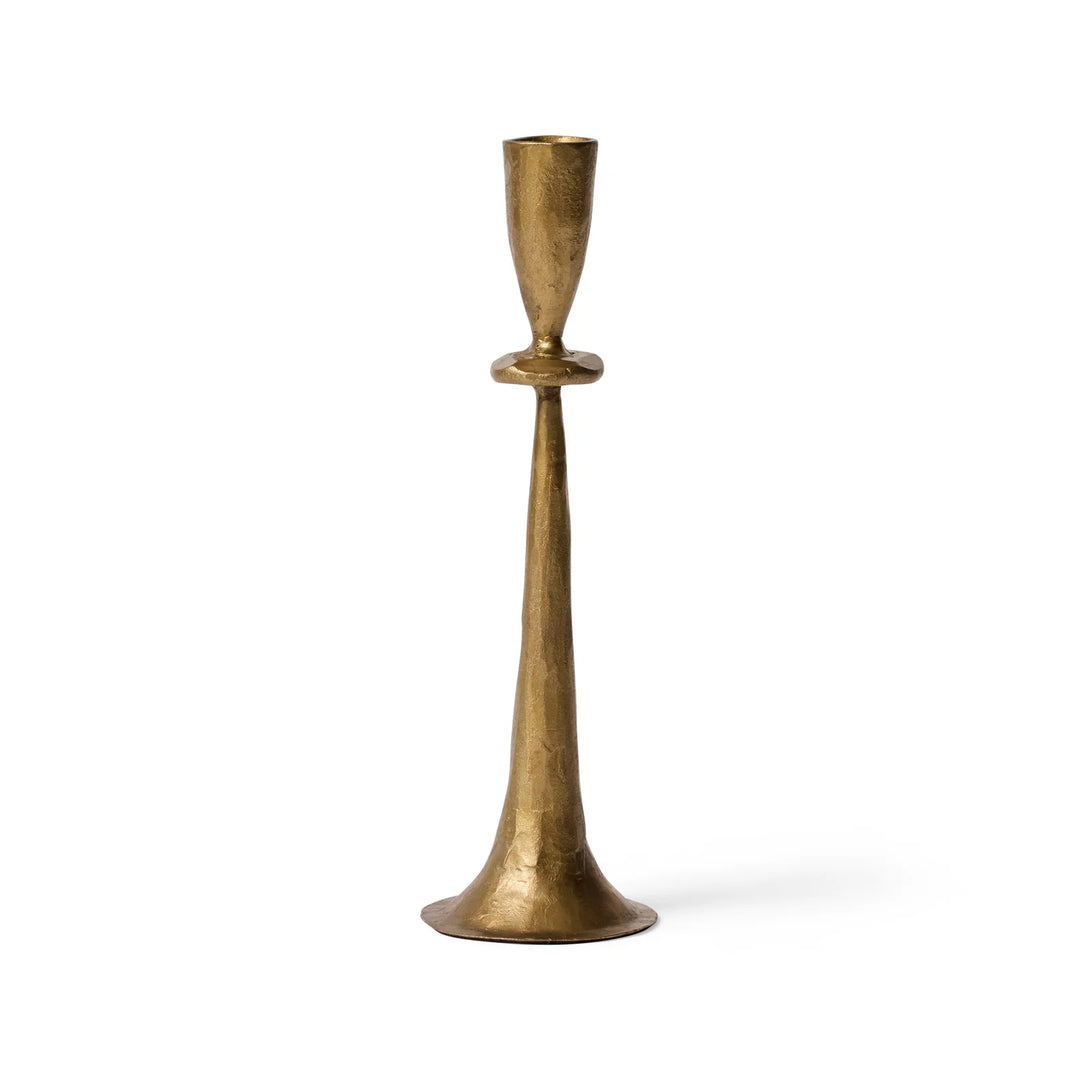 Brass candlestick on a white background