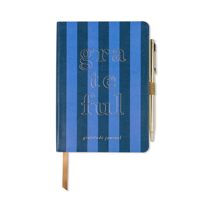 The DesignWorks Ink Gratitude Journal with a pen